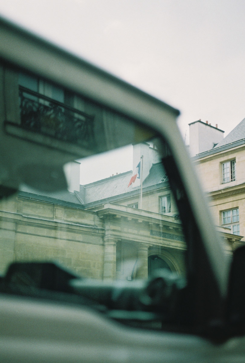 a view of a building through a car window.